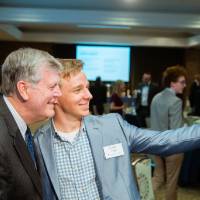 Student taking a selfie with President Haas at Scholarship Dinner 2019